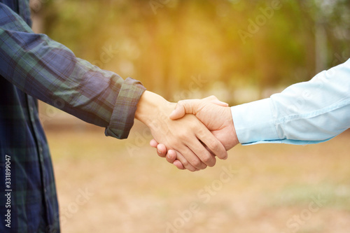 two male Shake hand ,businessman shake hand