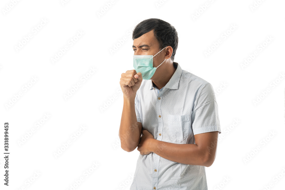 man wearing face masks and coughing isolated over white background man wearing face masks and coughing isolated over white background