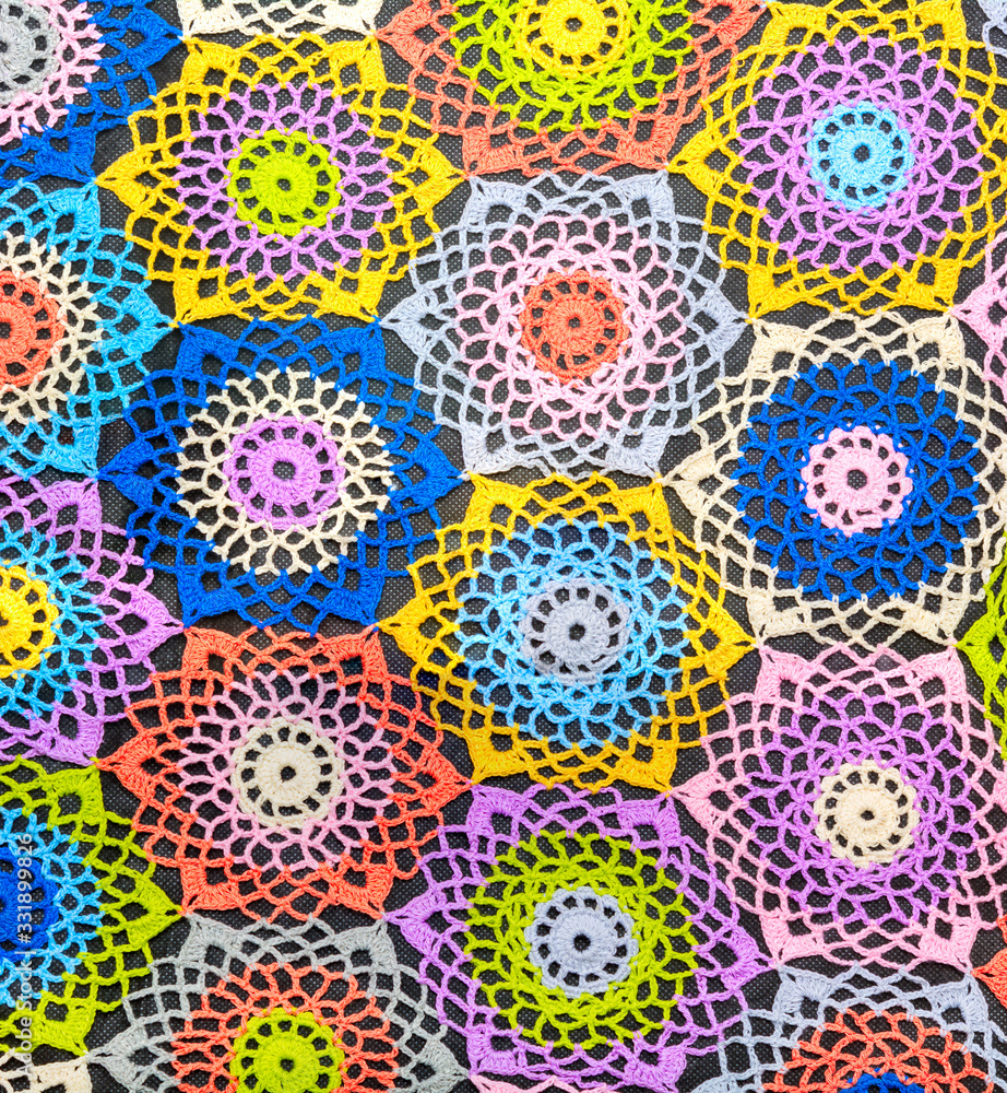 embroidery in the form of snowflakes as a background. embroidery in the form of snowflakes as a background.