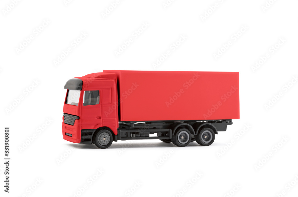 Red cargo delivery truck miniature isolated on white background with clipping path