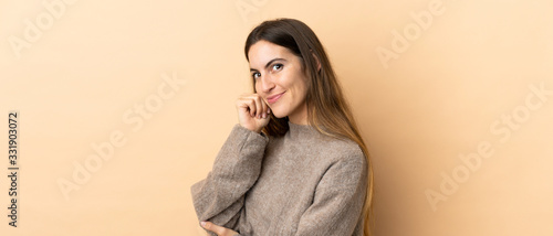 Young caucasian woman over isolated background with tired and bored expression