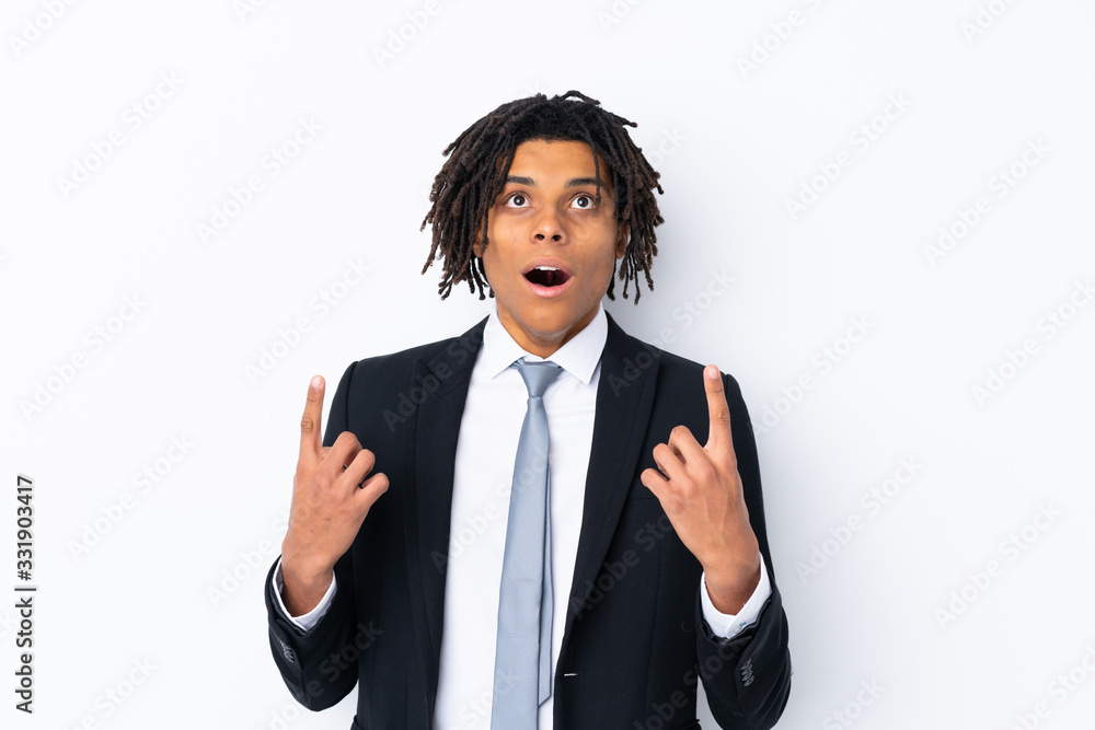 Young African American businessman man over isolated white background pointing with the index finger a great idea Young African American businessman man over isolated white background pointing with the index finger a great idea