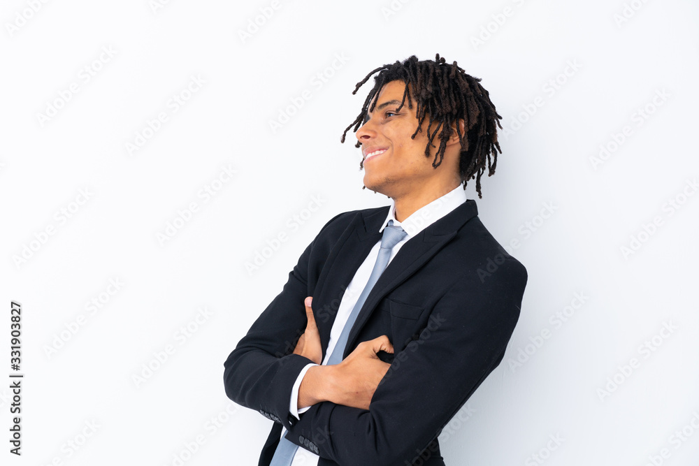 Young African American businessman man over isolated white background looking to the side Young African American businessman man over isolated white background looking to the side
