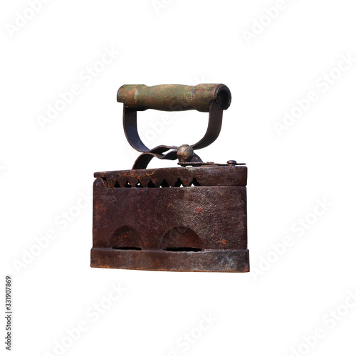 Old rusty iron iron with coals isolated on white background