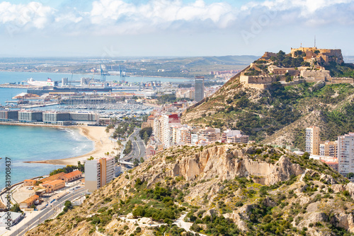 Panoramic view of Alicante  Valencian Community  Spain. In the foreground the Castle of Santa Barbara  the Postiguet beach and the port in the background with the city on its shore