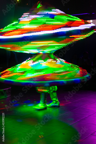 Dance of the Egyptian dervishes Tanura show. Light texture, blur background for design. photo