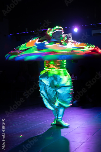 Dance of the Egyptian dervishes Tanura show. Light texture, blur background for design. photo