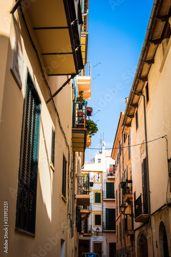 empty streets of Palma de Mallorca, with his old traditional and colorful houses 