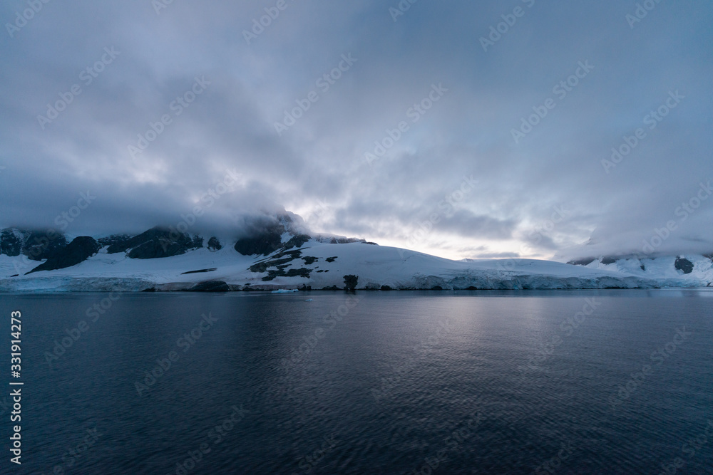 Sunrise in the Lemaire Channel in Antarctica