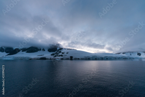 Sunrise in the Lemaire Channel in Antarctica