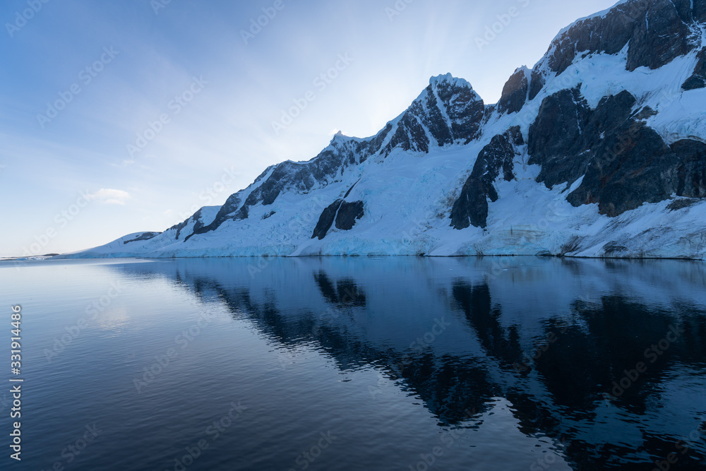 Reflection of landscape in ocean, Antarctica Landscape Reflection of landscape in ocean, Antarctica Landscape