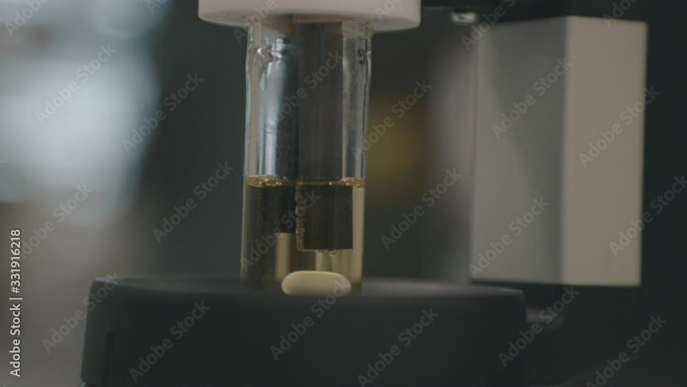 Scientist conducting research for medical drug to fight the COVID-19 virus amid corona pandemic. Closeup of a man's hand in gloves working in the laboratory. Scientist conducting research for medical drug to fight the COVID-19 virus amid corona pandemic. Closeup of a man's hand in gloves working in the laboratory.