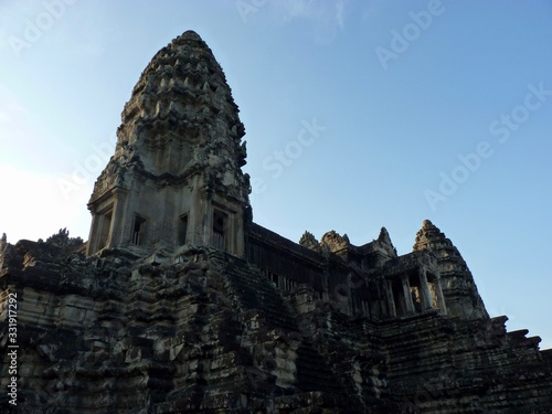 Stone pyramid of Angkor Wat before blue sky  ruins of Angkor  Cambodia