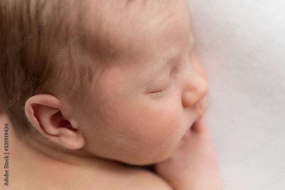 Sleeping newborn baby. Healthy and medical concept. Healthy child, concept of hospital and happy motherhood. Infant baby. Happy pregnancy and childbirth. Children's theme. Baby and childen's goods Sleeping newborn baby. Healthy and medical concept. Healthy child, concept of hospital and happy motherhood. Infant baby. Happy pregnancy and childbirth. Children's theme. Baby and childen's goods