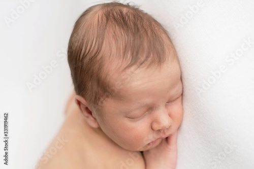 Sleeping newborn baby. Healthy and medical concept. Healthy child, concept of hospital and happy motherhood. Infant baby. Happy pregnancy and childbirth. Children's theme. Baby and childen's goods