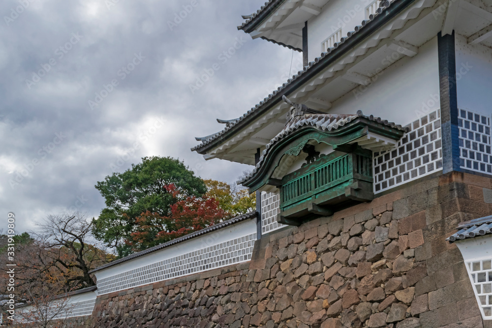 November sunny day scenery of Kanazawa castle featuring details of traditional Japanese architecture.  Kanazawa Japan.