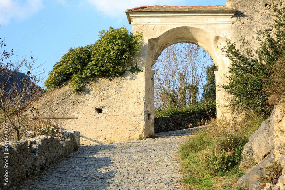 Finalborgo (SV), Italy - December 12, 2017: The patway to Finalborgo castle, Finale Ligure, Liguria, Italy