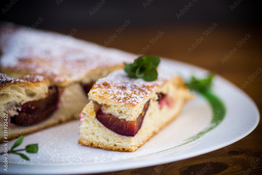 sweet baked homemade plum cake with icing sugar sweet baked homemade plum cake with icing sugar