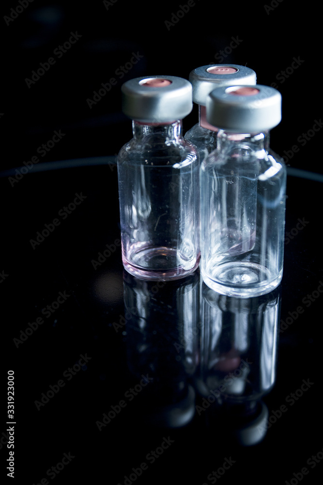 Vaccine vials against virus Vaccine vials against virus