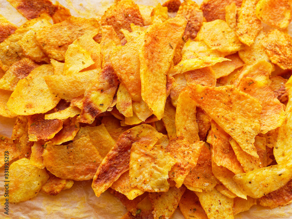 Homemade Chips. A pile of crisps close-up. Junk food.