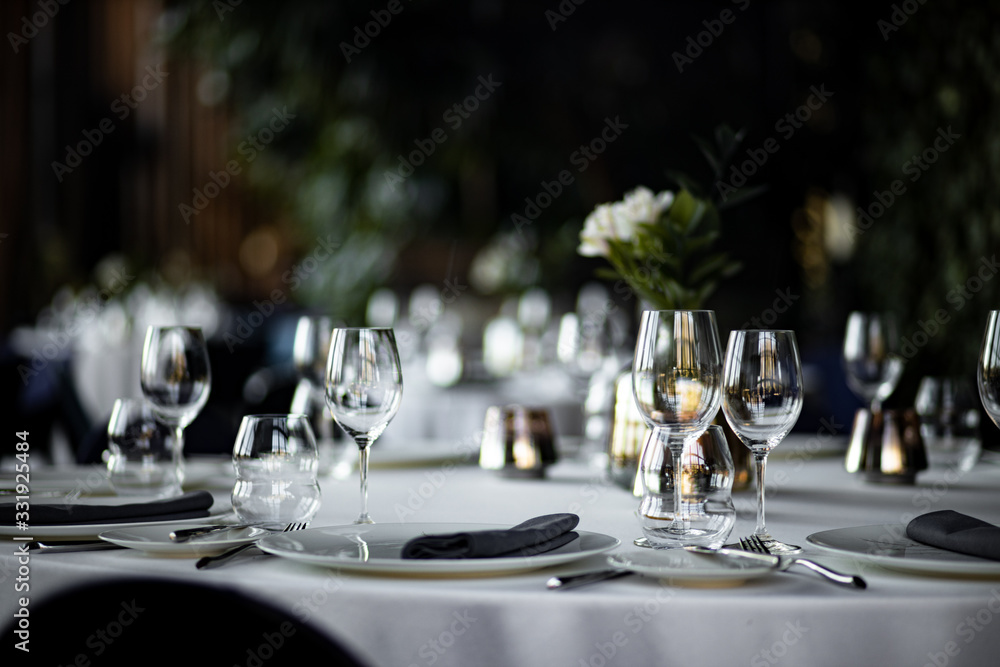 Fototapeta premium Beautiful table set for an event party or wedding reception . restaurant interior