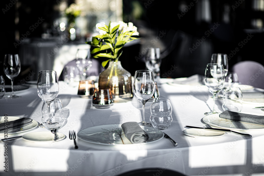 Fototapeta premium Beautiful table set for an event party or wedding reception . restaurant interior