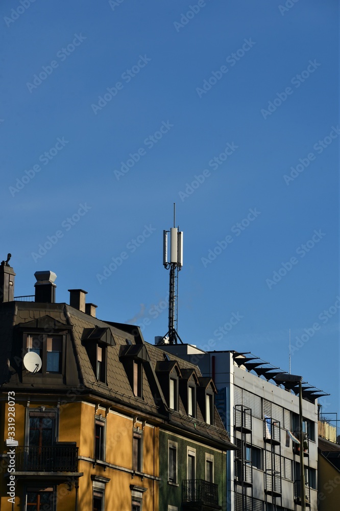 mobile antenna on a house roof in the city of zurich switzerland