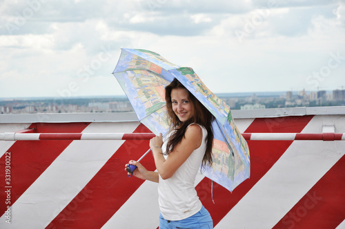 Portrait of a smiling beautiful woman holding umbrella. happy woman hold umbrella. summer and spring joy. sunny or rainy weather forecast. sexy girl with parasol. fashion accessory