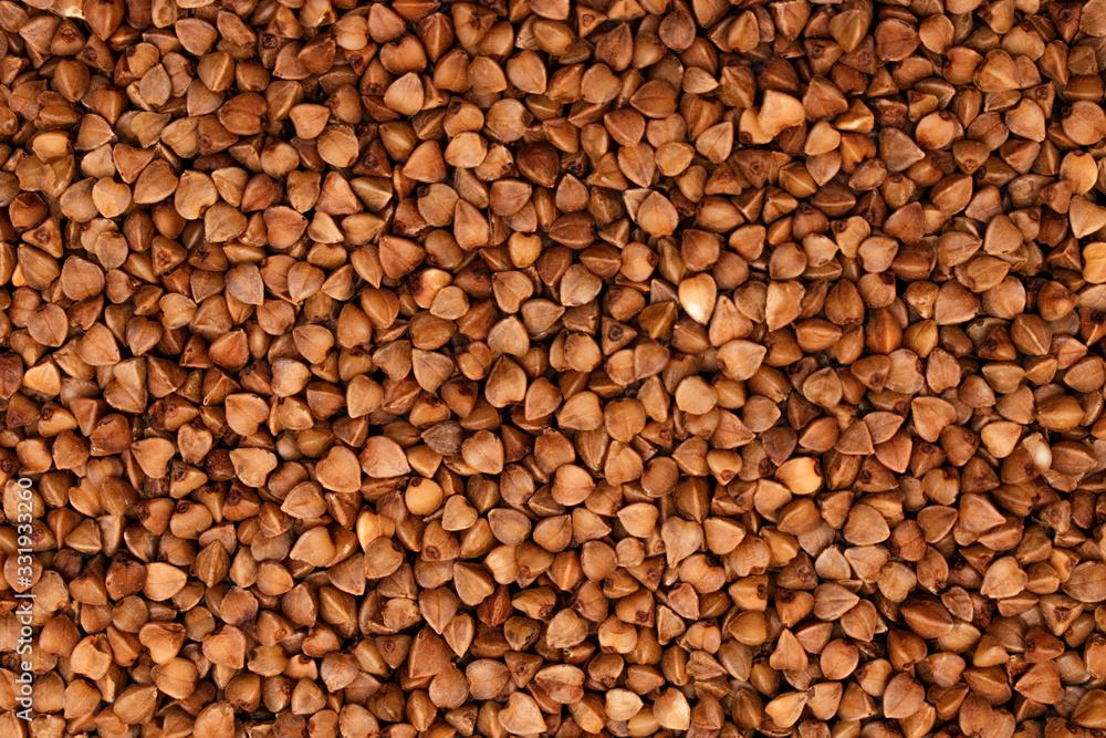 Buckwheat deficit concept.Coronavirus pandemic concept.Buckwheat close up. Buckwheat texture Buckwheat deficit concept.Coronavirus pandemic concept.Buckwheat close up. Buckwheat texture