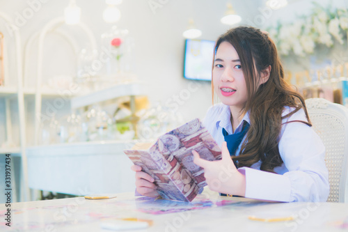 Girl student in a coffee shop