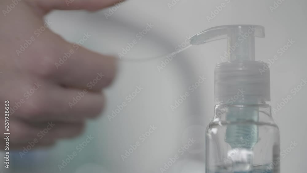 4K Washing hands: Slow motion liquid hand soap dispenser with shallow depth of field. 4K Washing hands: Slow motion liquid hand soap dispenser with shallow depth of field.