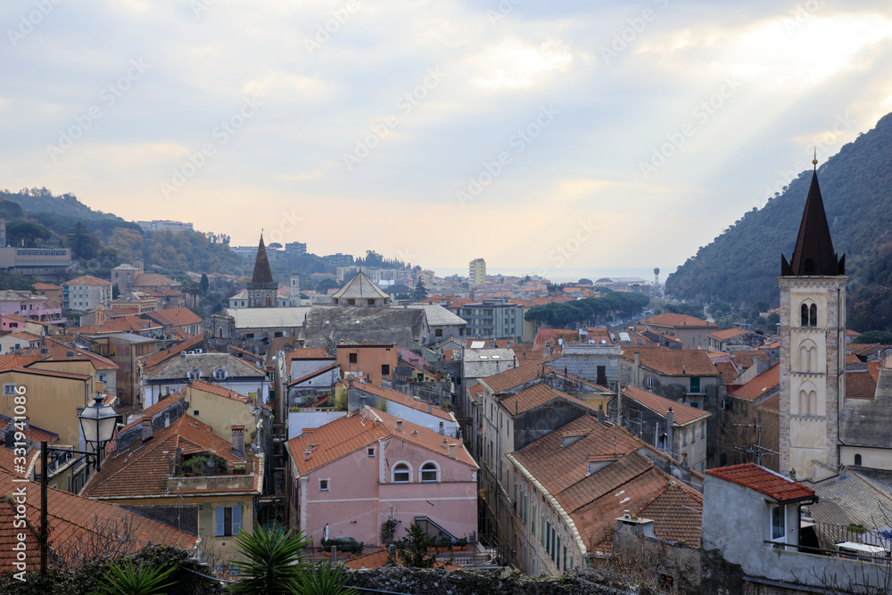 Fototapeta premium Finalborgo (SV), Italy - December 12, 2017: Finalborgo village and bell tower view from Finalborgo Castle, Finale Ligure, Liguria, Italy