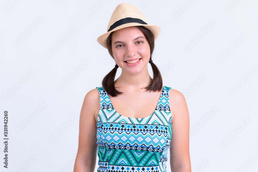 Portrait of happy young beautiful tourist woman smiling Portrait of happy young beautiful tourist woman smiling