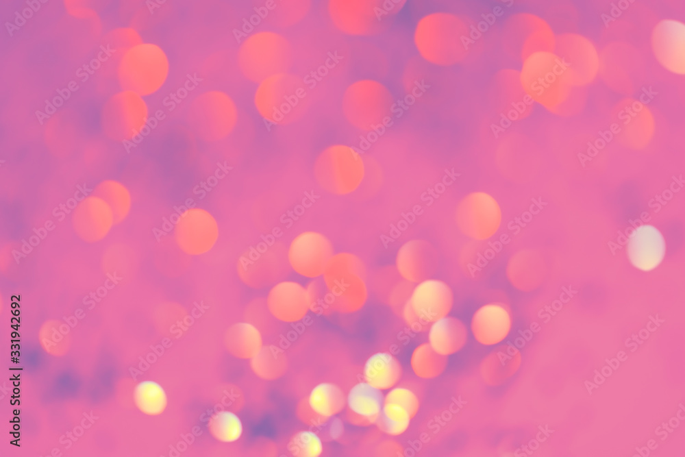 Pink-purple abstract bokeh background. Beautiful sparkling color festive texture.