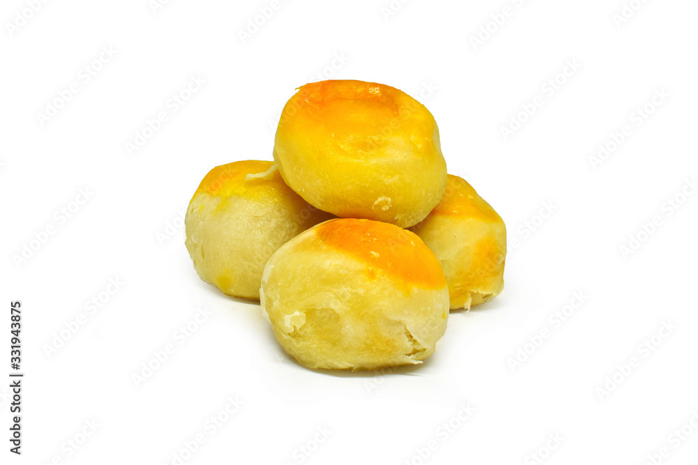 Chinese pastry or moon cake filled with mung bean paste and salted egg yolk isolated on white background. Clipping path