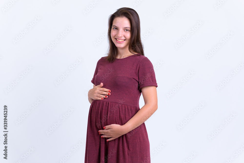 Portrait of happy young beautiful pregnant woman smiling Portrait of happy young beautiful pregnant woman smiling