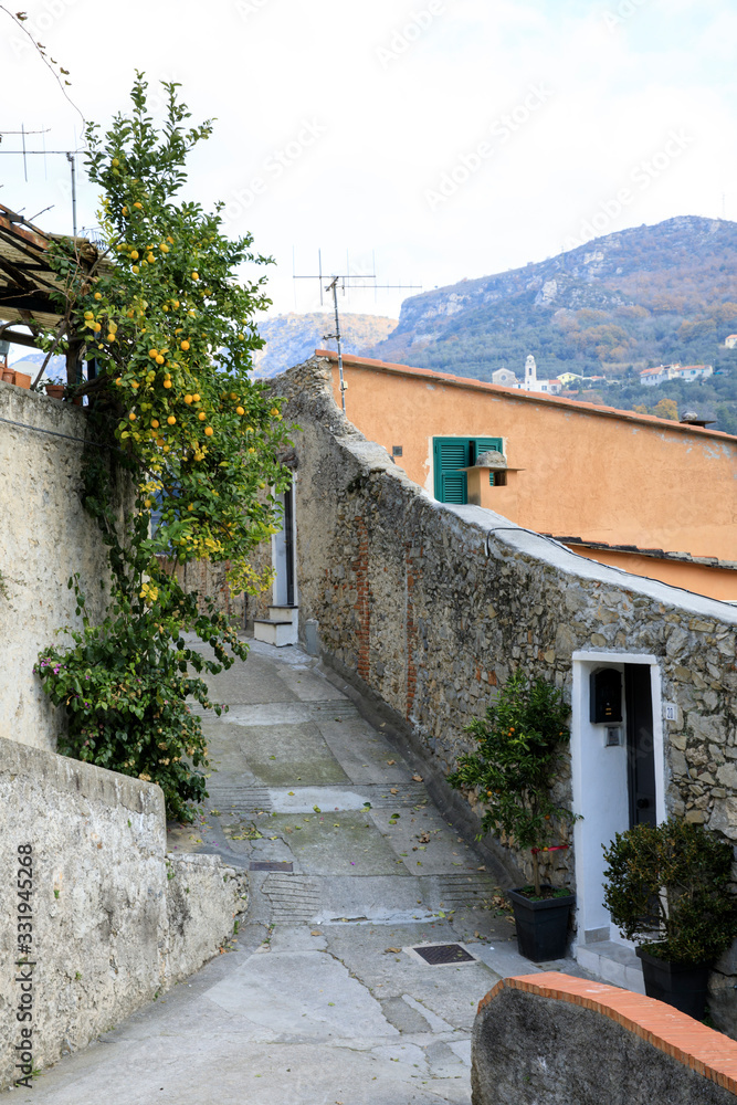 Finalborgo (SV), Italy - December 12, 2017: A typical pathway in Finalborgo village, Finale Ligure, Liguria, Italy