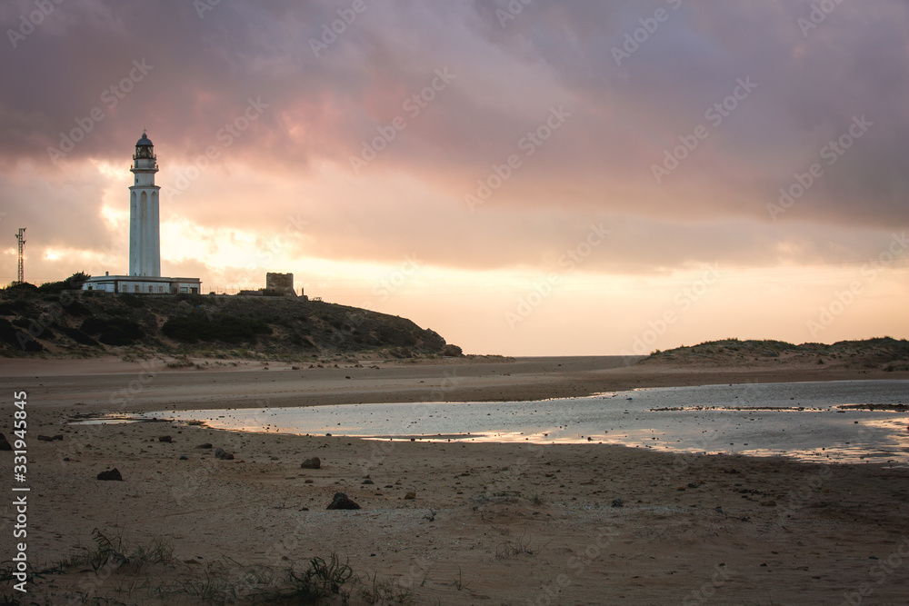 A Lighthouse in the South of Spain during Twilight Sunset