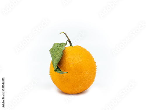Orange with a branch and a leaf