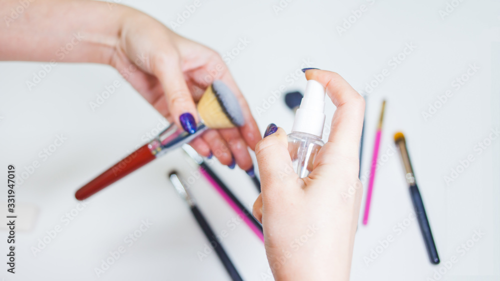 Hygienic care of makeup artist tools, women's hands wash the brush from cosmetics, soap and cleaning products, Hygienic care of makeup artist tools, women's hands wash the brush from cosmetics, soap and cleaning products,