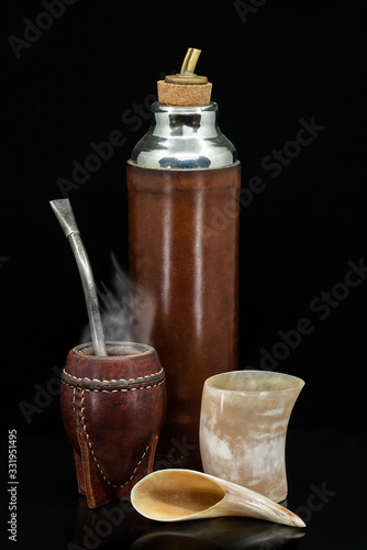 mate and a thermo from Uruguay with black background