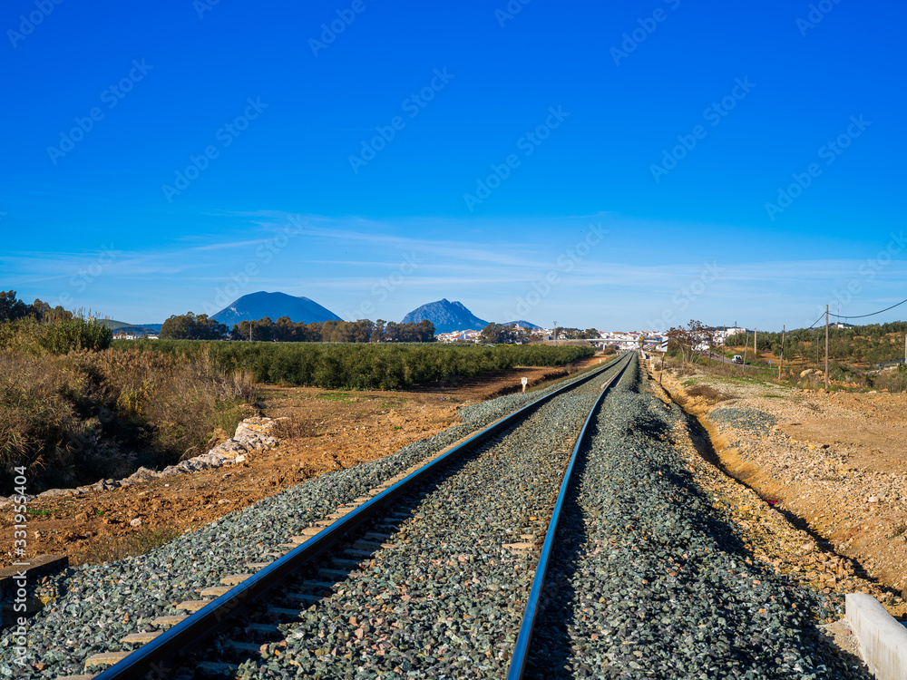 Empty railroad track on countryside in Spain Empty railroad track on countryside in Spain