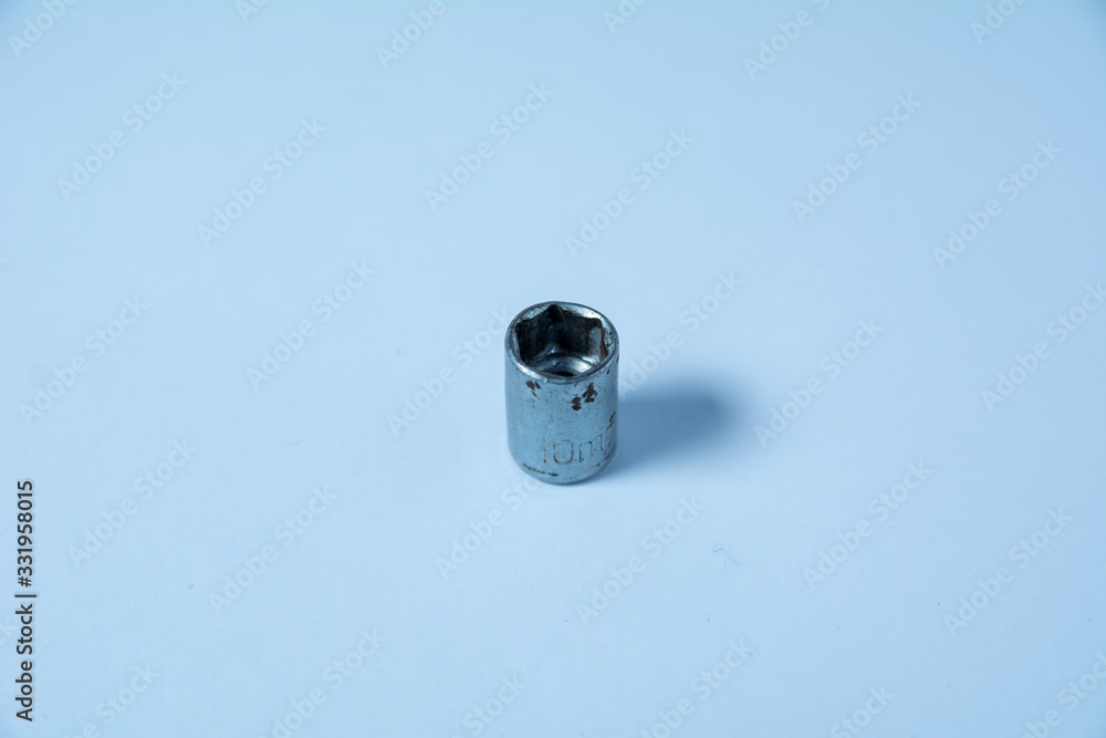 A bite to unscrew the screws, photographed on a white background A bite to unscrew the screws, photographed on a white background
