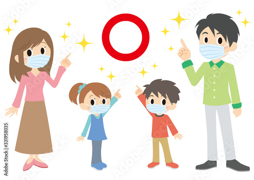 マスクで指差す親子