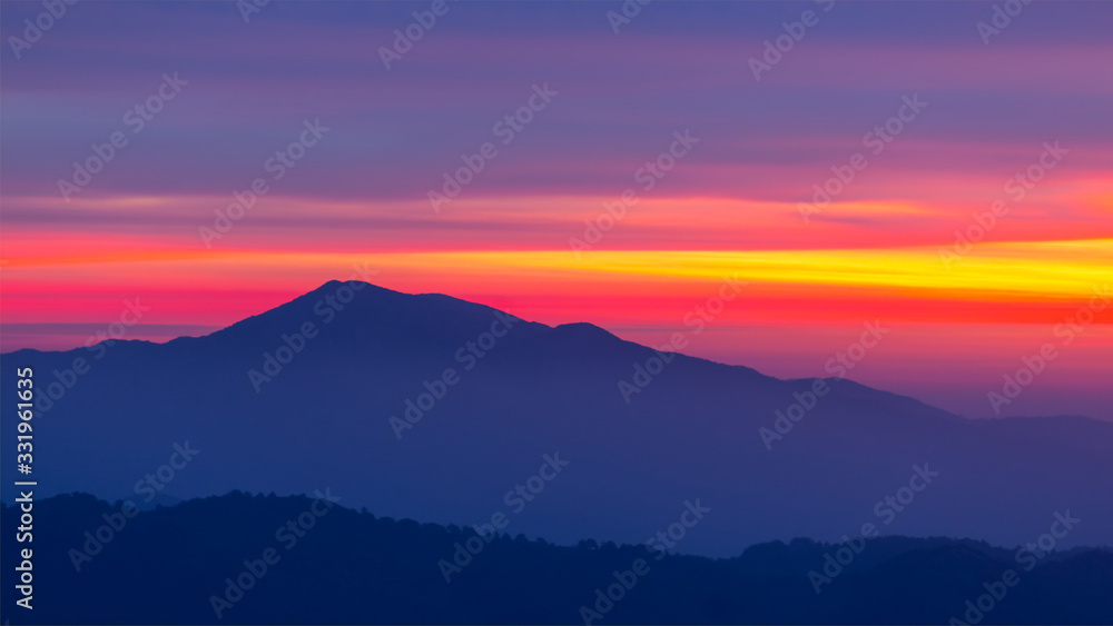 mount silhouette on a dramatic sky background at the twilight, good outdoor background