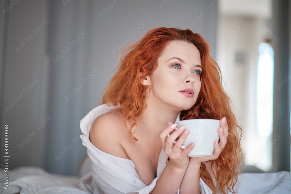 custom made wallpaper toronto digitalstayhome concept, attractivewoman sitting in bed , holding cup of black coffee, enjoying peaceful calm weekend vacation morning time alone in bedroom at home or hotel.