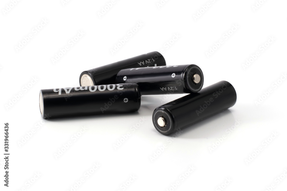 four black batteries isolated four black batteries isolated