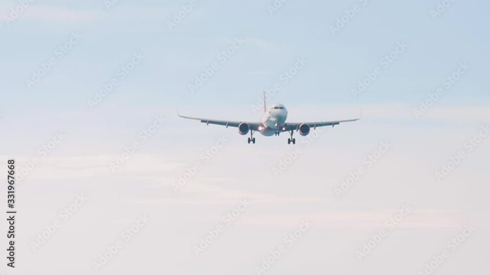 Airplane approaching over ocean before landing Airplane approaching over ocean before landing