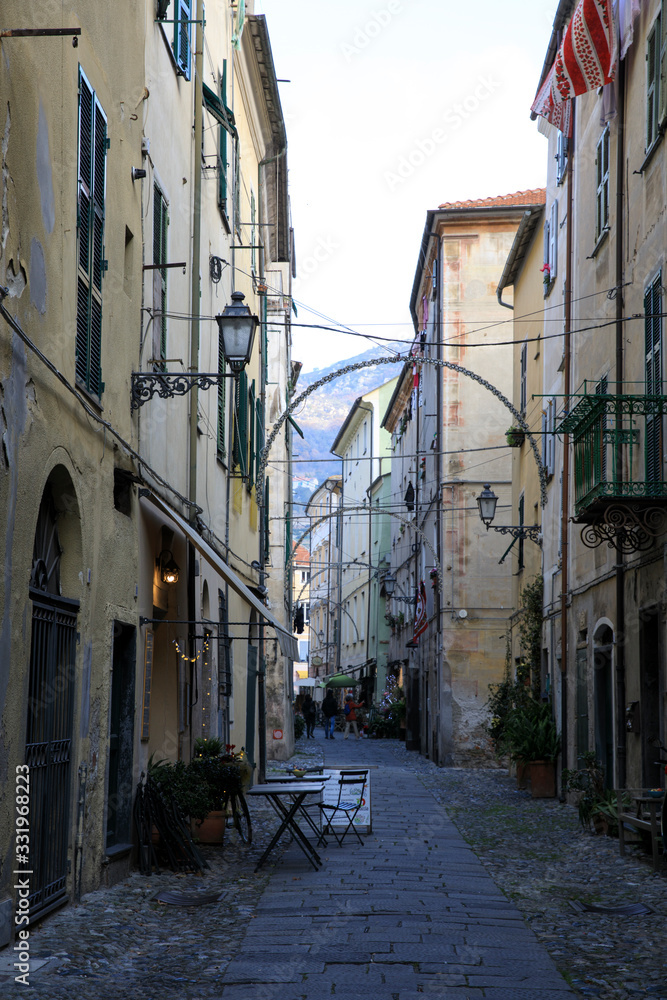 Finalborgo (SV), Italy - December 12, 2017: A typical house and pathway in Finalborgo village, Finale Ligure, Liguria, Italy