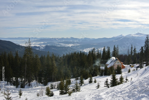 Hotel house in the Karpaty mountains during the winter with forest background, Dragobrat 